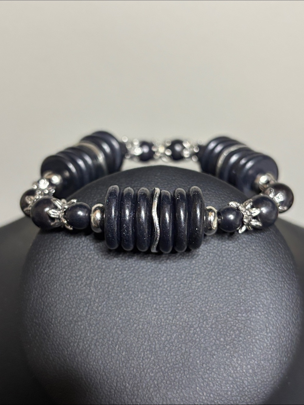 Stacked Dark Black Disc Bead Bracelet with Silver Accents